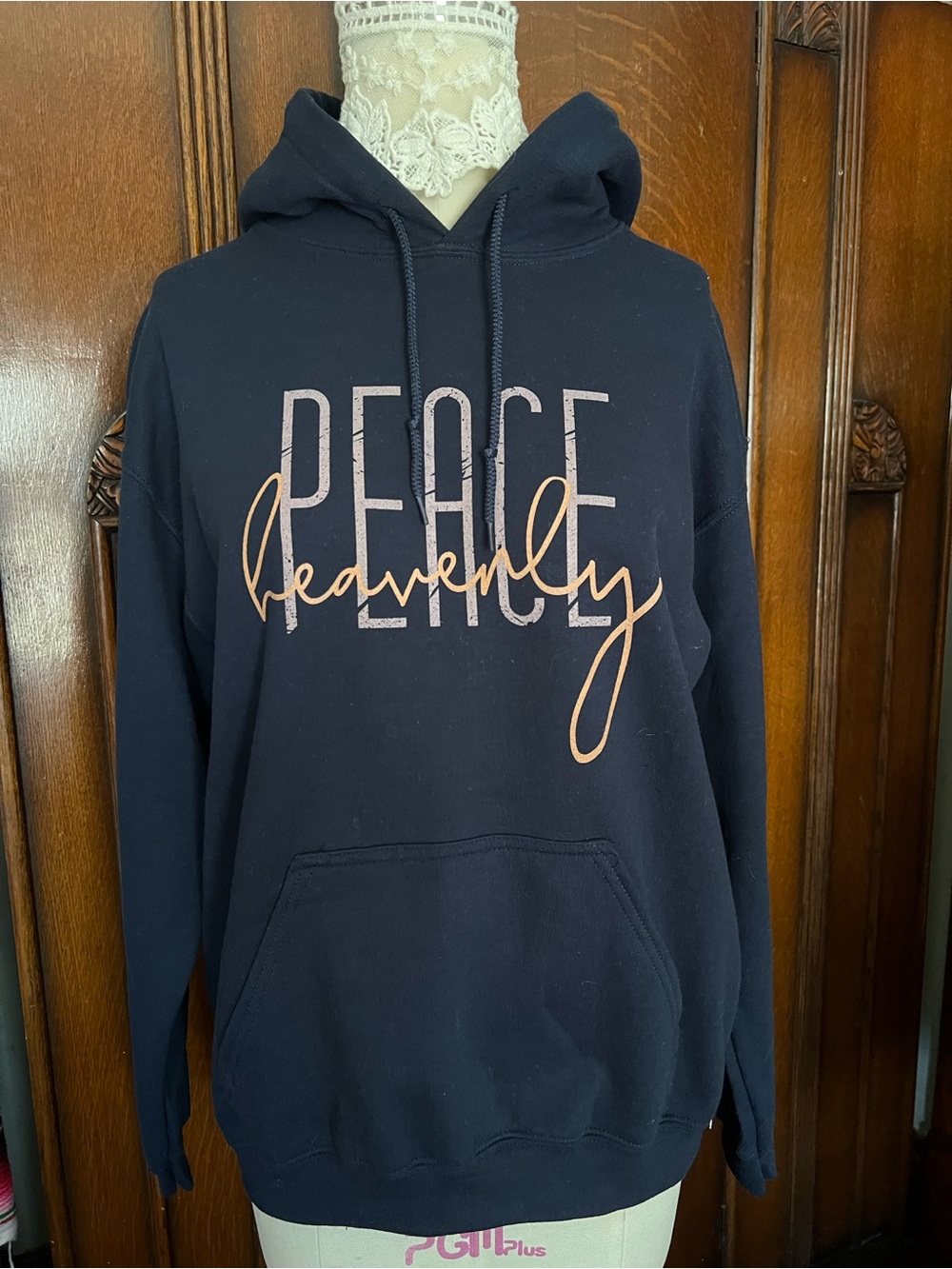 Crowned Free Navy Hooded Sweatshirt with Script 'Heavenly Peace' Graphic